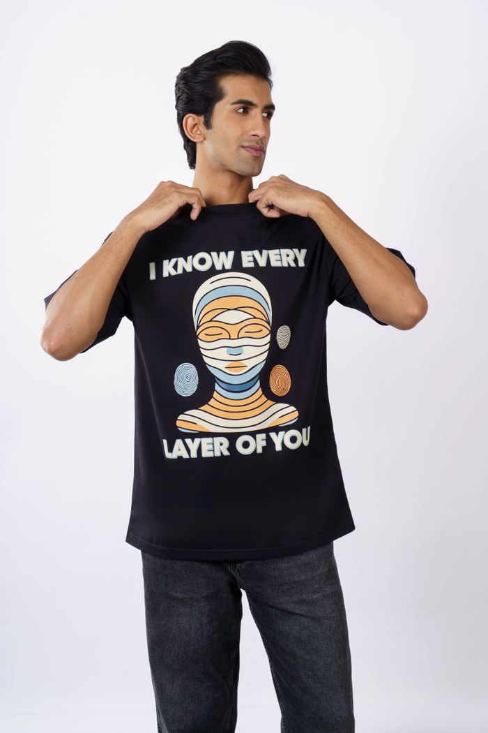 Trendy oversized t-shirt for men featuring an abstract artistic print. Perfect for casual wear.